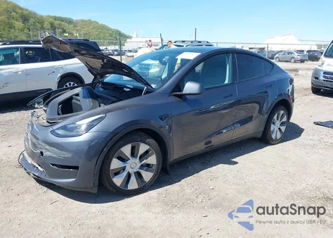 2023 Tesla Model Y Awd/Long Range Dual Motor All-Wheel Drive z USA, uszkodzony, nr VIN 7SAYGDEE8PA191415